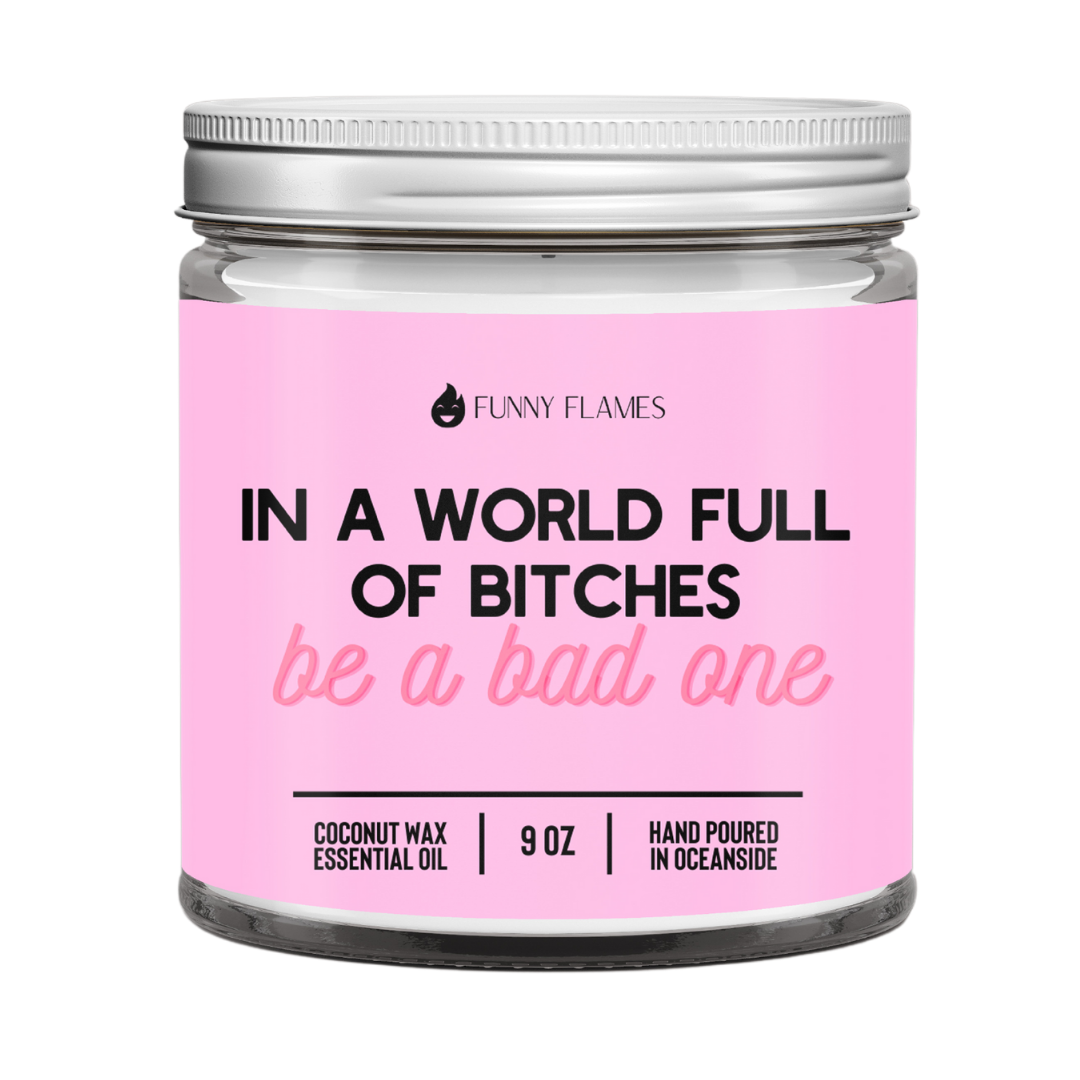 Candle jar with pink label featuring humorous text and 'Funny Flames' branding.